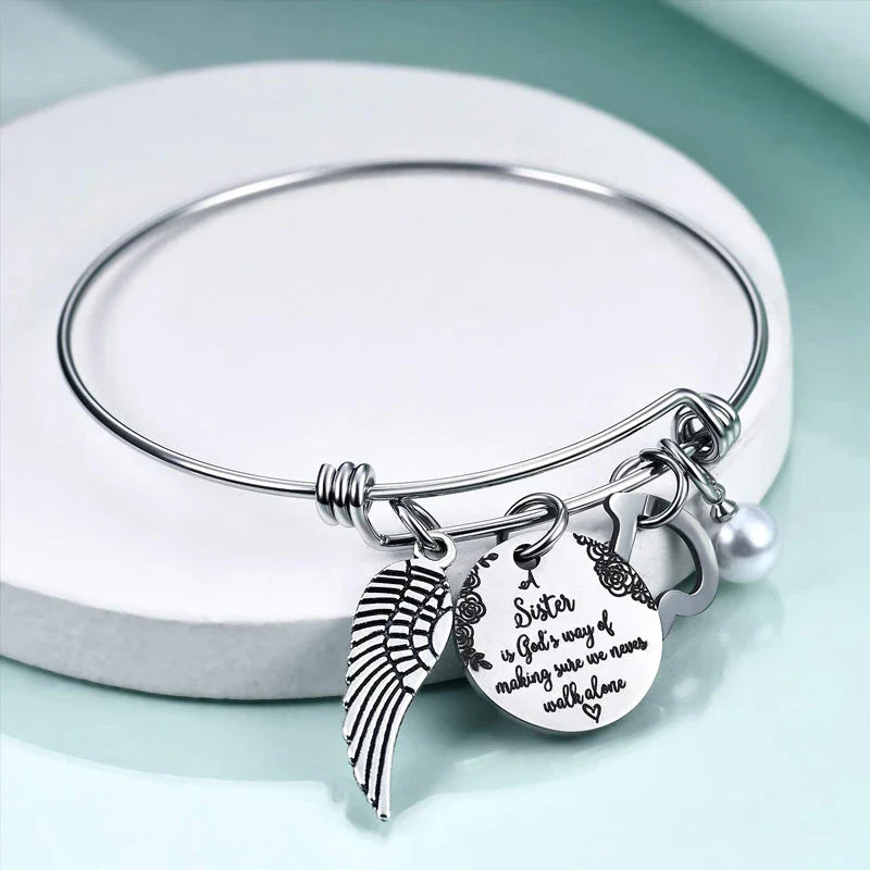 A "Sister is God's Way Of Making Sure We Never Walk Alone" Bangle