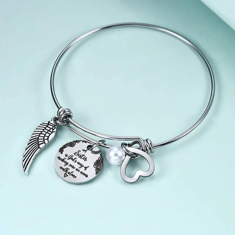 A "Sister is God's Way Of Making Sure We Never Walk Alone" Bangle