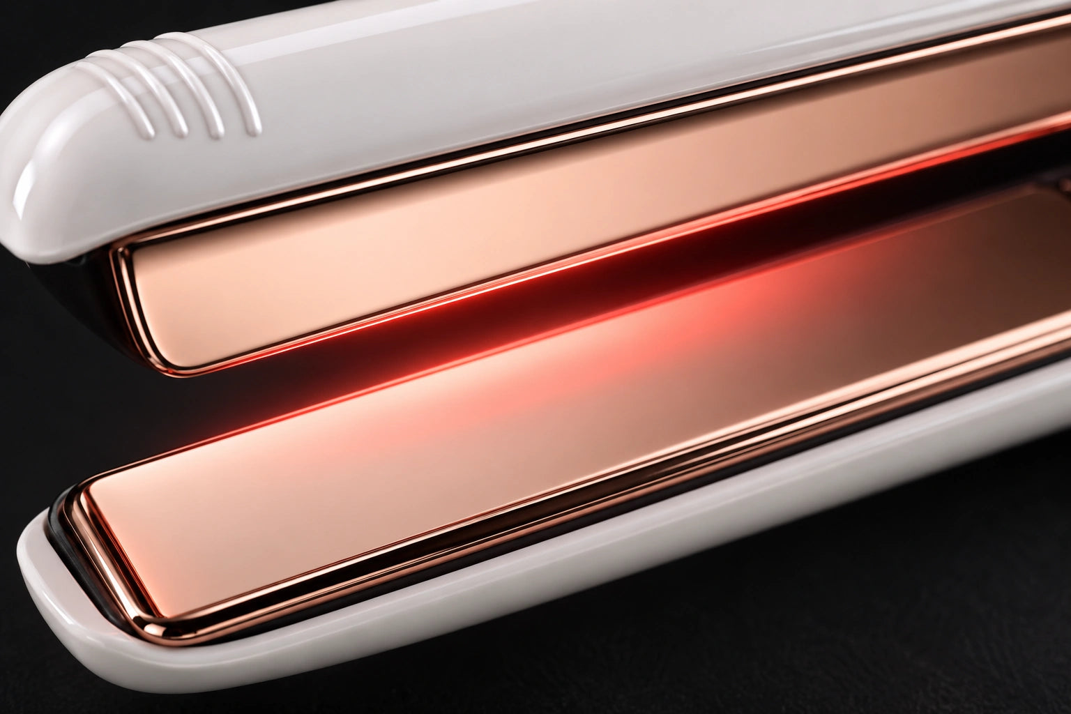 Extreme close-up of the rose-gold titanium plates with red infrared light glowing